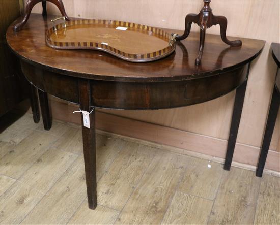 A pair of George III mahogany D end dining tables W.124cm